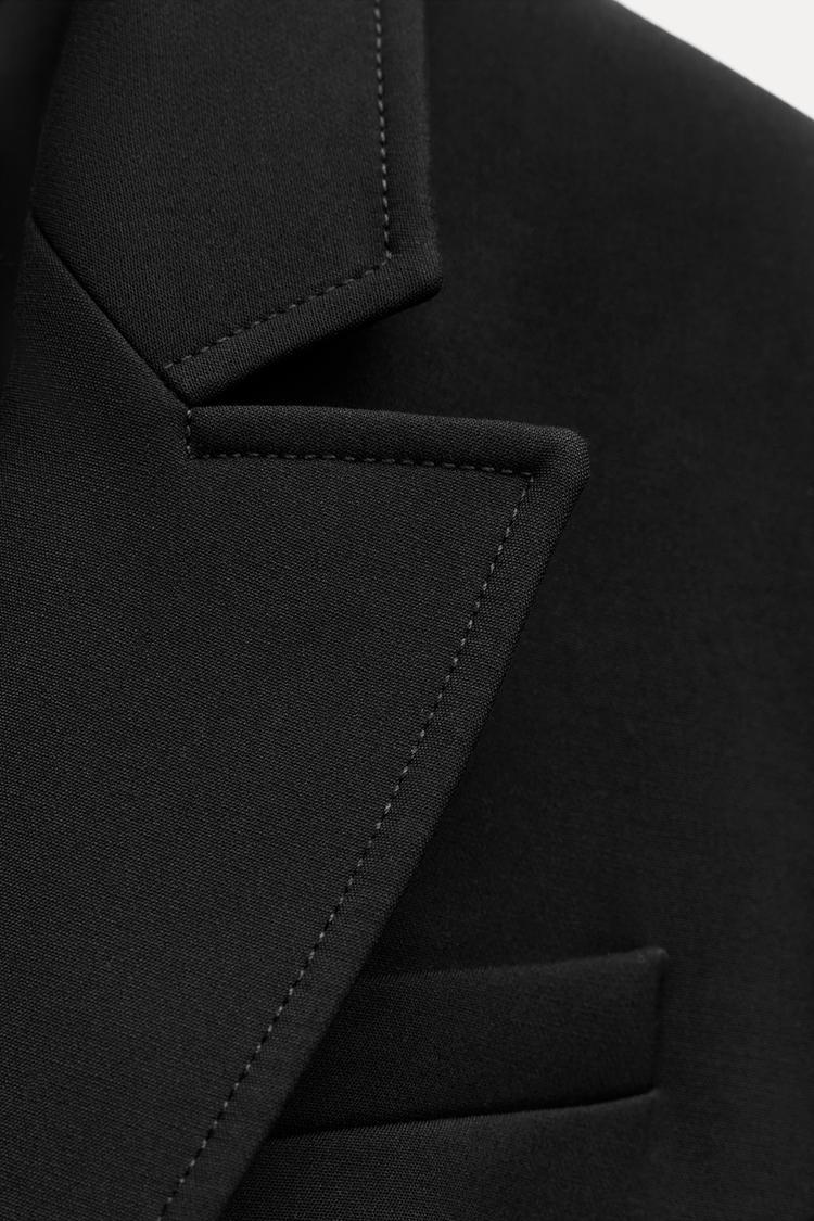 Manteau long croisé classique et chic 